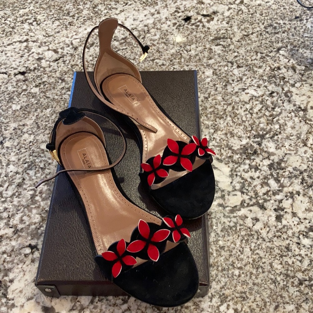 ALaia suede sandals with red flowers